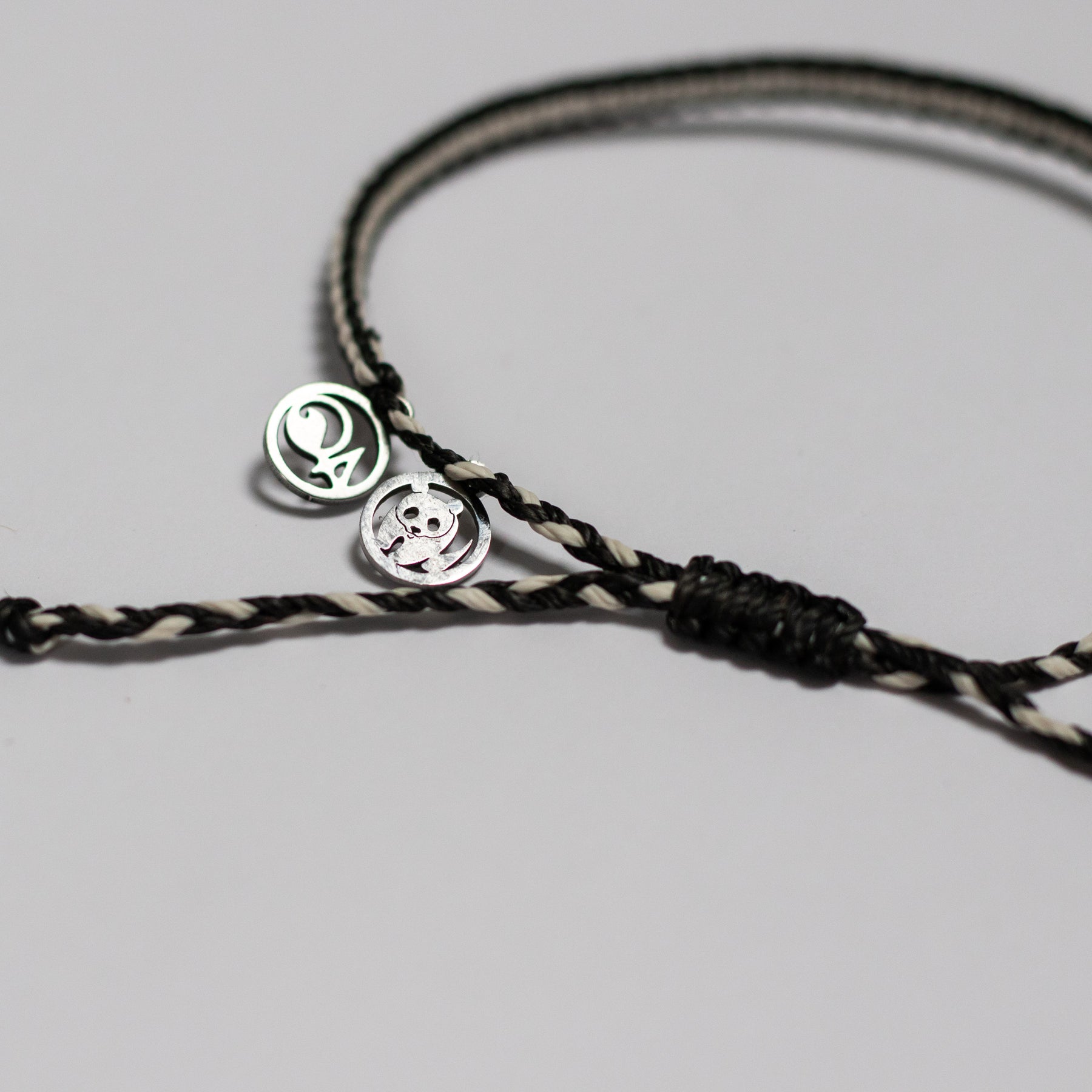 4Ocean Armband // WWF Logo // Schwarz-Weiß